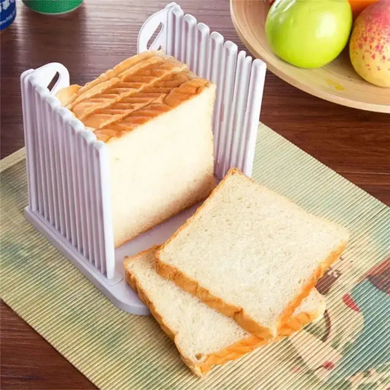 Bread slices arranged inside the white bread slicer, showing its capacity to evenly cut slices for sandwiches and toast.